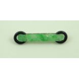 A carved jade and black onyx panel brooch,