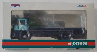 A Showerings Ltd Corgi ERF flatbed lorry,