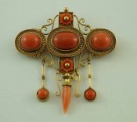 A Victorian archaeological revival gold and coral brooch pendant,