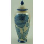 A Moorland Chelsea works vase and cover, with tubelined poppies on a white pearlescent ground,