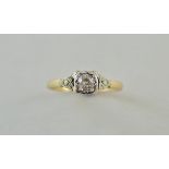 A single stone diamond ring, the illusion set brilliant of approximately 0.