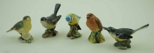 A collection of Five Beswick figures of birds, comprising of the Blue Tit,