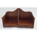 A late Victorian mahogany book caddy with two handles, two drawers and bun feet,