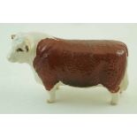 A Beswick figure of a Hereford bull, printed factory marks in black and painted “Ch of Champions”,