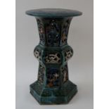 A pottery garden seat with pierced hexagonal flared base, 52.