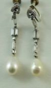 A pair of diamond and pearl drop earrings,