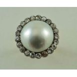 A Mabe cultured pearl and diamond cluster ring, Austrian control marks,