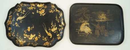 A Victorian black papier mache shaped tray, decorated in gilt with birds on leafy branches, 43.