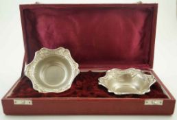 A pair of American silver lobed hexagonal sweet or grape dishes,