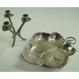 A large plated leaf shaped dish,