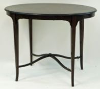 An Edwardian mahogany oval occasional table, on square tapering legs linked by shaped stretchers,