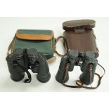 A pair of Prinz binoculars, along with Miranda binoculars,