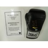 A black Everlast boxing glove,