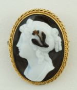 A hard stone cameo brooch, carved as a classical female profile, in a cord edge mount, 2.