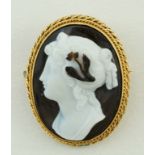 A hard stone cameo brooch, carved as a classical female profile, in a cord edge mount, 2.