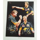 A signed photograph of darts player, Simon "The Wizard" Whitlock, 41cm high, 30.