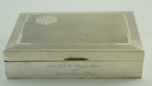 A silver cigarette box, by Sampson & Mordan, Birmingham 1934, with engine turned decoration,