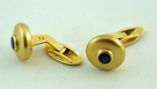 A pair of gold and sapphire cufflinks, stamped '750' and BB makers mark, 27.