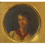 A 19th century papier mache round snuff box cover painted with a portrait of a lady within a gilded