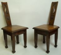 A pair of oak "Boot" chairs made in 1931, Kingwood Bristol,