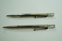 Two Chester hallmarked silver pencils,