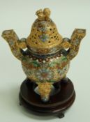 A Chinese champlevé korro and cover with dog of Fo finial to the pierced cover,