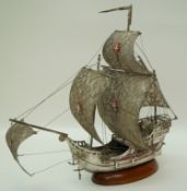 A Portuguese silver sailing ship, 833 standard Gondomar mark, with filigree sails, 41cm long,