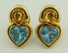 A pair of blue topaz and citrine earrings, stamped '750', 23.