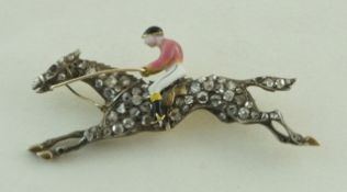 A diamond and enamel horse and jockey brooch,