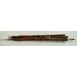 A large collection of modern and vintage fishing rods,