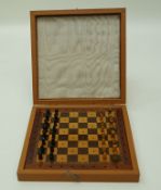 A Jacques carved wood and inlaid travelling chess set in original hinged box,