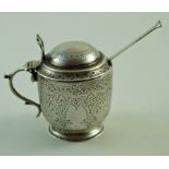 A Victorian silver mustard pot, by Aldwinkle & Slater, London 1885, with engraved decoration,