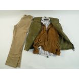 A leather and camouflage shooting vest and two Orvis shirts,