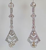 A pair of diamond drop earrings, in the Art Deco style,