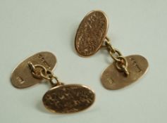 A pair of 9 carat gold engraved cufflinks, 6.