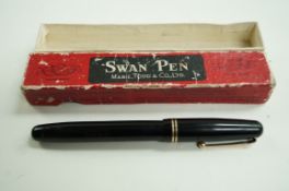 A Swan self filler fountain pen (Mabie Todd), with original Swan 2D 14 carat nib, heart shape hole,