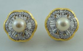 A pair of cultured pearl and diamond earrings, stamped '750',