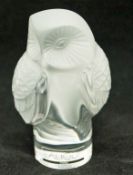 A Lalique figure of an owl, on a cylindrical base, etched factory mark and label, 8.