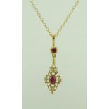 A 9 carat gold ruby and diamond pendant, on a chain, pendant 3cm long, chain 40cm long, 3.