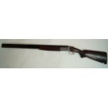 A 12 bore, Classic Double shotgun, over and under multichoke,