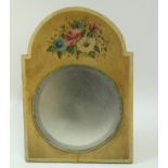 A decorative mirror, the arched frame painted with flowers on a beige ground, with easle stand,