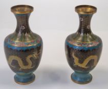 WITHDRAWN A pair of Chinese cloisonné vases decorated with dragons chasing a flaming pearl,