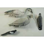 A collection of decoys to include six pigeons,