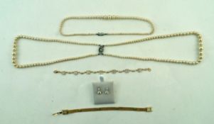 A small gilt metal bracelet and other stone set jewellery items and simulated pearls