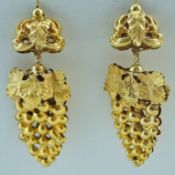 A pair of gold drop earrings, taking the form of fruiting vines, 5cm long, 7.