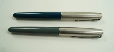 Two Parker 51's fountain pens, 1948, grey and blue, aeromatic filling,