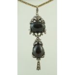 A mid Victorian garnet and rose diamond pendant,