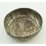 A white metal bowl, inscribed TM over AC 1674, 9cm diameter,