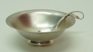 A silver Georg Jensen bowl, designed by Harald Nielsen, number 575C, post 1945 marks,