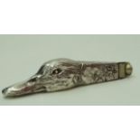 A cigar cutter in the form of a ducks head, apparently unmarked, 14.